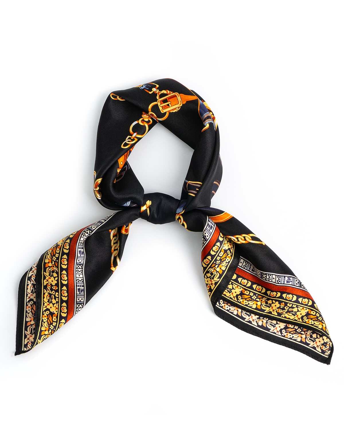 A knotted black and gold silk scarf featuring an elegant chain design, showcasing a luxurious and stylish accessory.