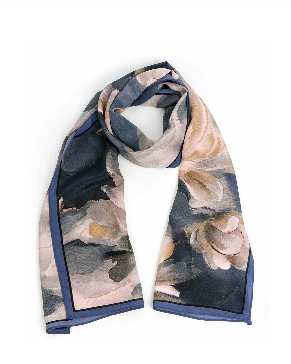 A rectangular silk scarf featuring a vibrant floral design, elegantly draped to showcase its intricate patterns.