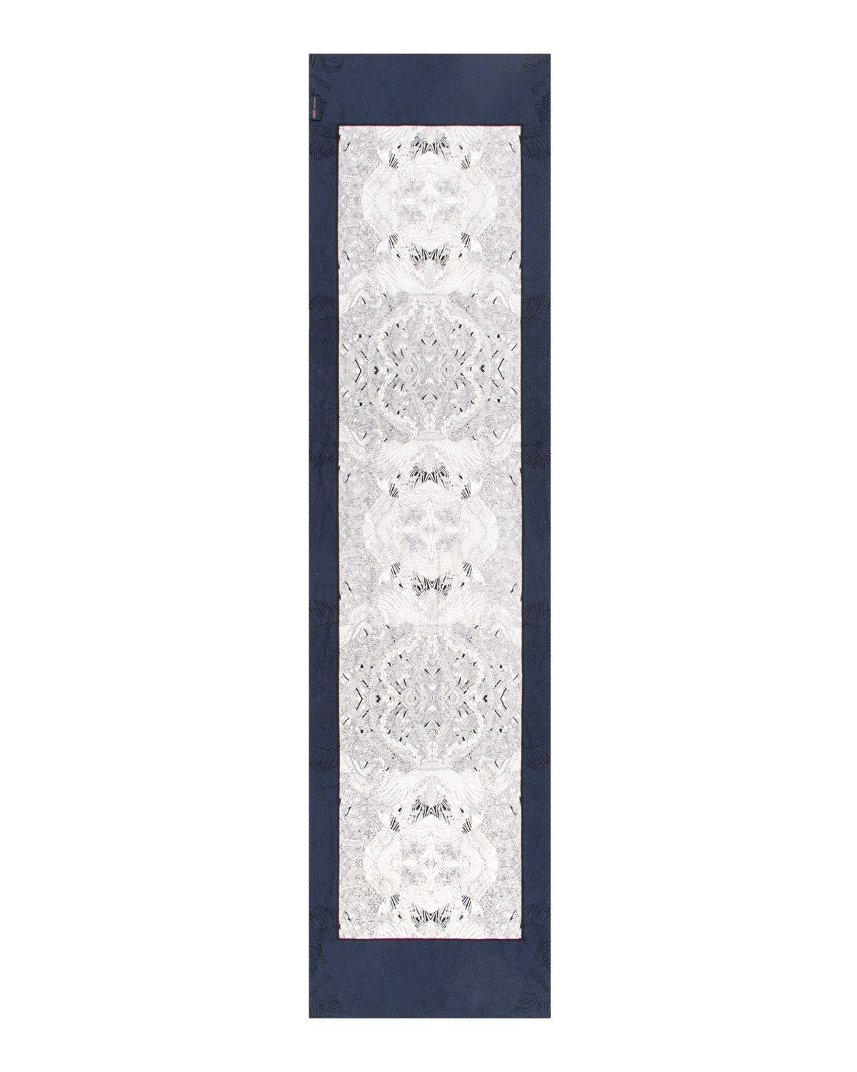 A silk scarf featuring a blue and white design pattern, elegantly displayed against a white background.